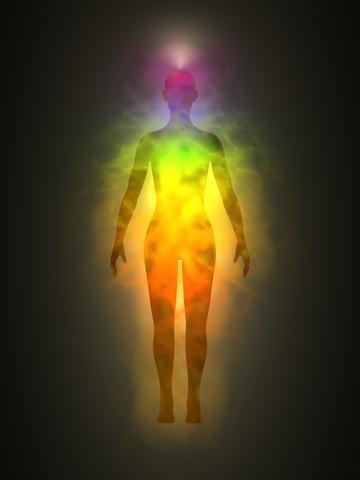 http://www.dreamstime.com/royalty-free-stock-image-woman-silhouette-aura-chakras-energy-image21243416